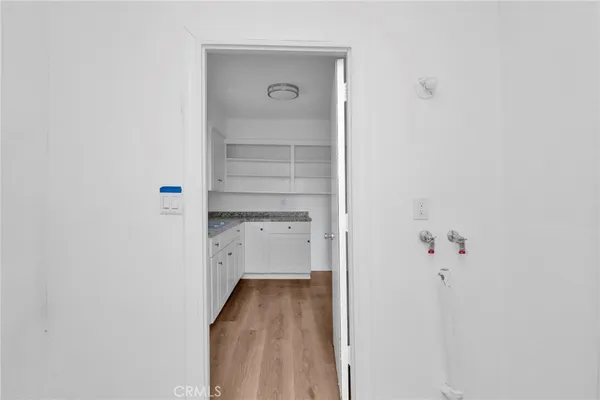 a view of hallway with closet