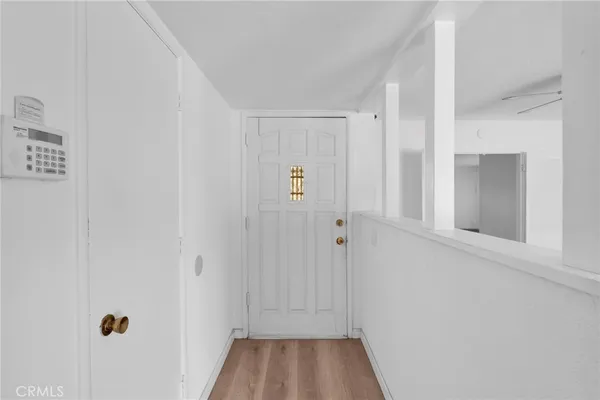 a view of a hallway with closet