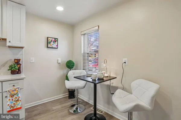 a workspace with furniture and wooden floor