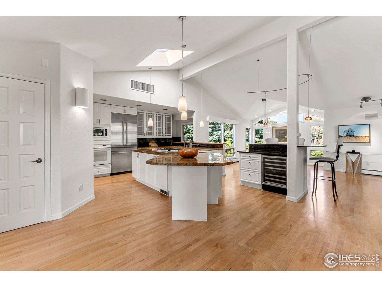 3725 Spring Valley Road Boulder, CO 80304 - Photo 11 of 40 Grantie counters, prep sink, Bosch refrigerator + wine refrigerator, pantry and coutertop seating.