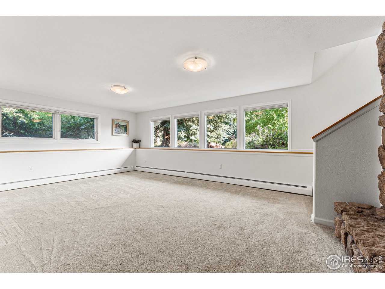 3725 Spring Valley Road Boulder, CO 80304 - Photo 27 of 40 An abundance of windows from the lower recreation room.