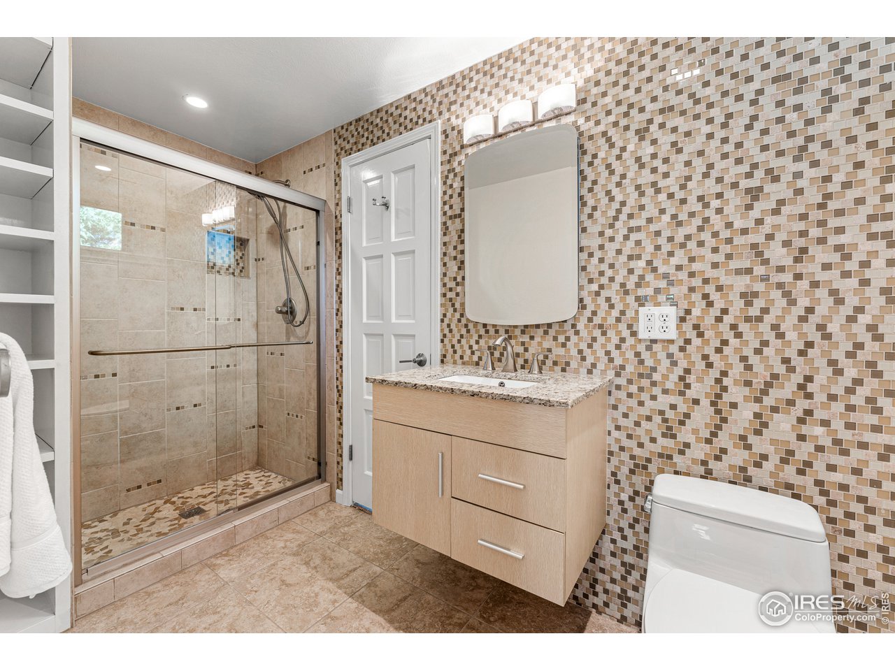 3725 Spring Valley Road Boulder, CO 80304 - Photo 29 of 40 Lower level 3/4 bath with custom tile