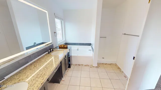 a bathroom with a bathtub sink and toilet