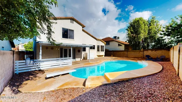 swimming pool with outdoor seating