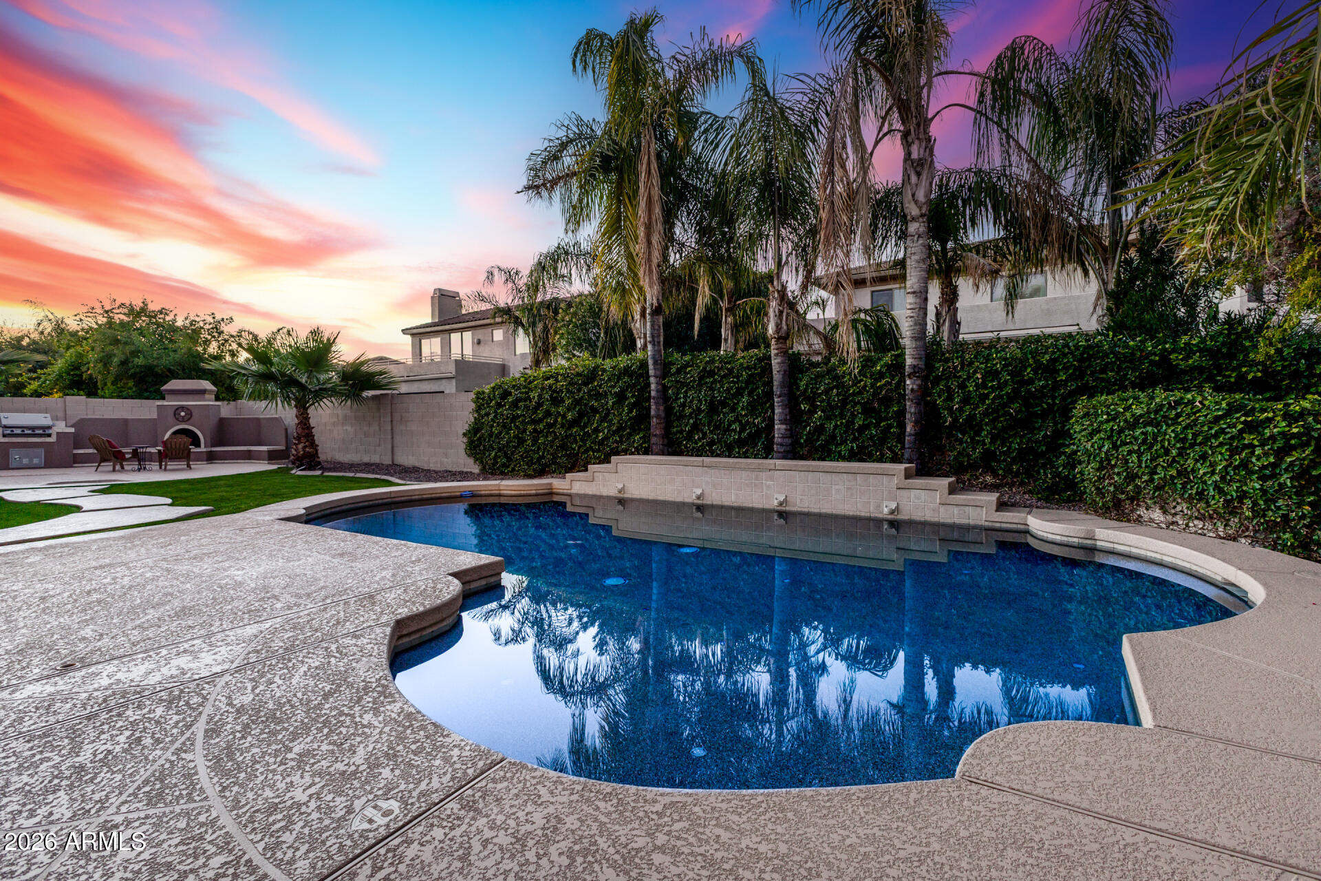 a view of a swimming pool with a patio