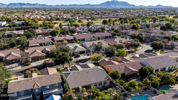 an aerial view of a house with a garden