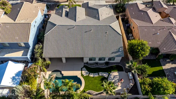 a view of a park with large trees