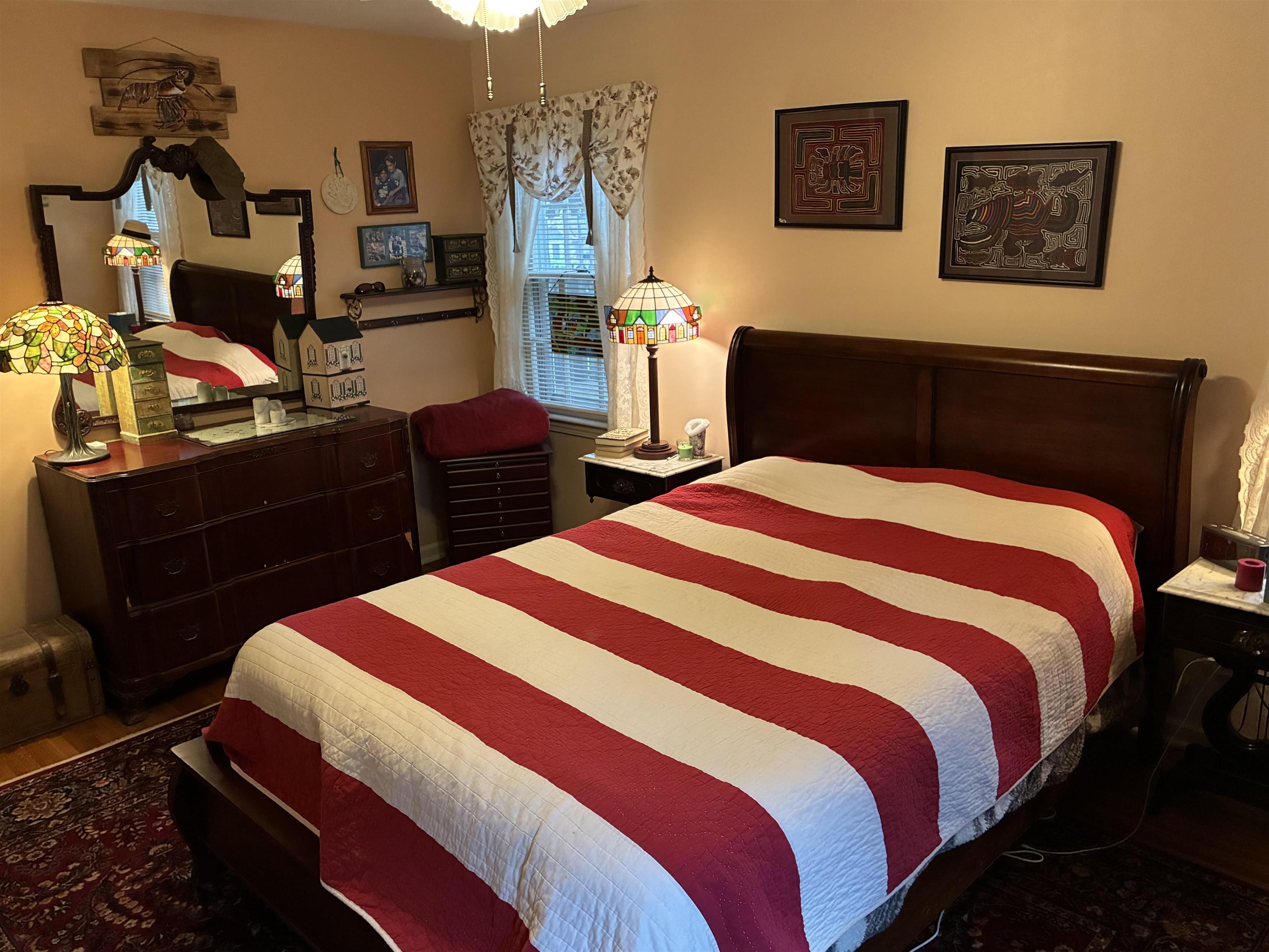 3194 Lammermuir Road Memphis, TN 38128 - Photo 17 of 40 a bedroom with bed and chair