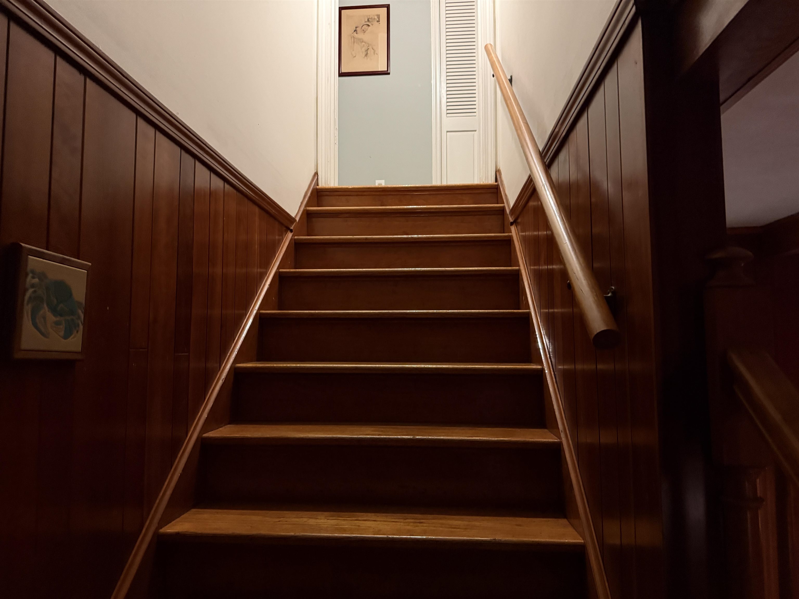 3194 Lammermuir Road Memphis, TN 38128 - Photo 30 of 37 Hardwood staircase with a natural finish, complemented by a wooden handrail