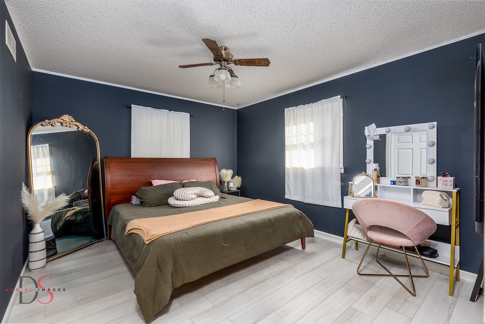 2106 Cedar Avenue Mendota, IL 61342 - Photo 11 of 24 a bedroom with a bed and a chandelier