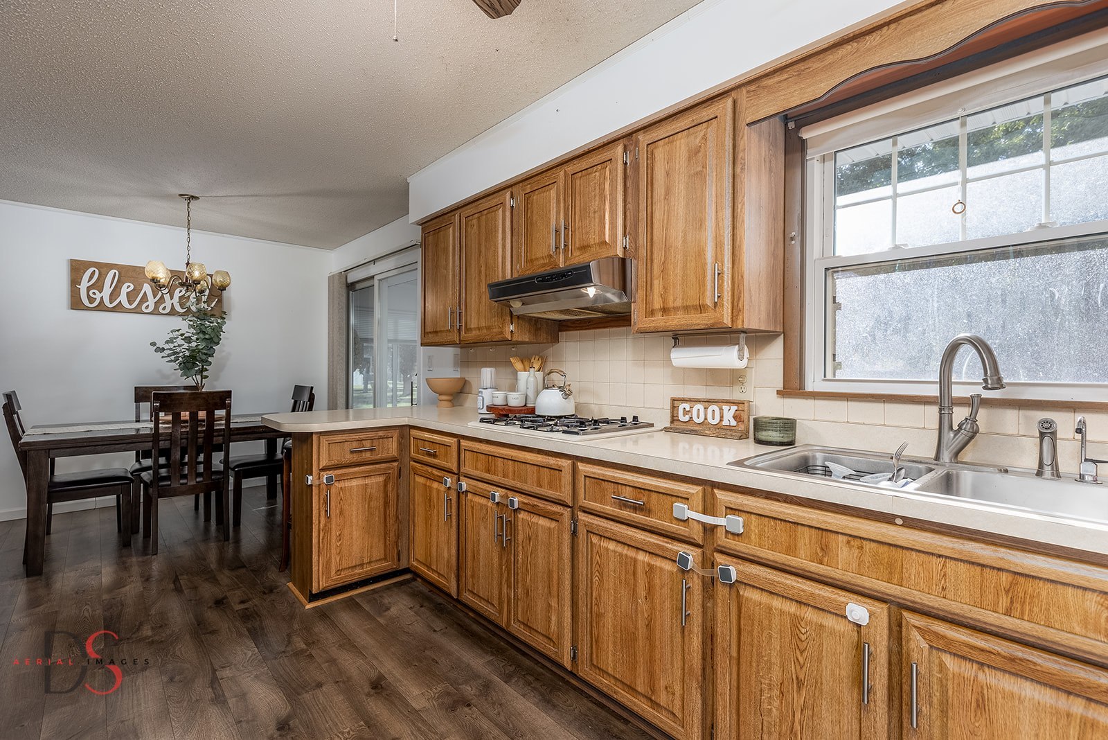 2106 Cedar Avenue Mendota, IL 61342 - Photo 17 of 24 a kitchen with sink cabinets and dining table
