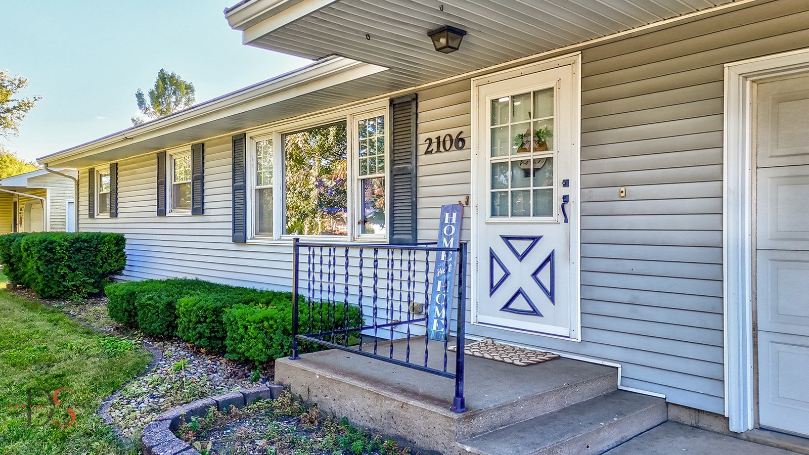 2106 Cedar Avenue Mendota, IL 61342 - Photo 3 of 24 a view of front door and brick wall