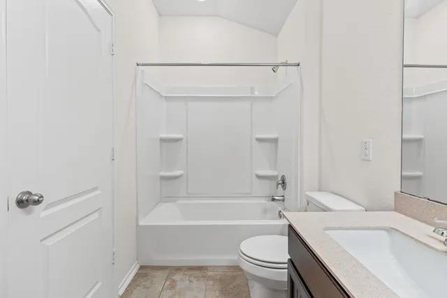 a bathroom with a sink a toilet and a bathtub