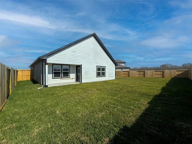 a house view with a garden space