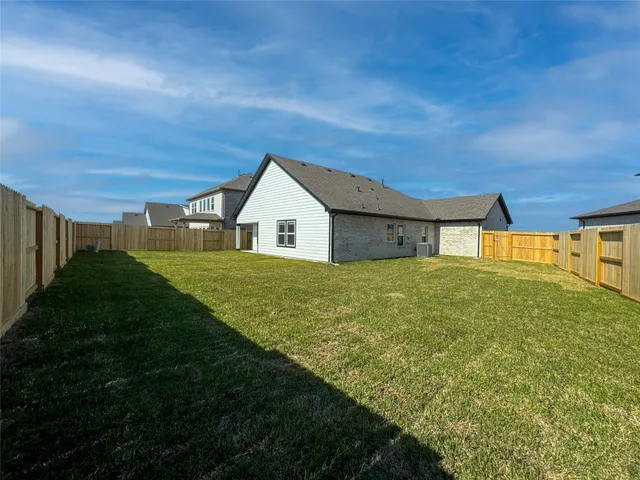 a house view with garden space