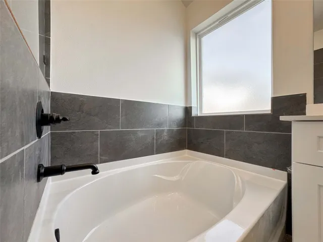 a bathroom with a bathtub