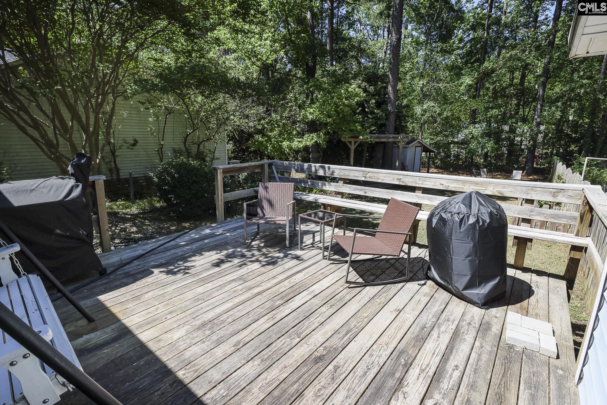 152 Thames Valley Court Irmo, SC 29063 - Photo 2 of 32 a view of balcony with wooden floor and outdoor seating