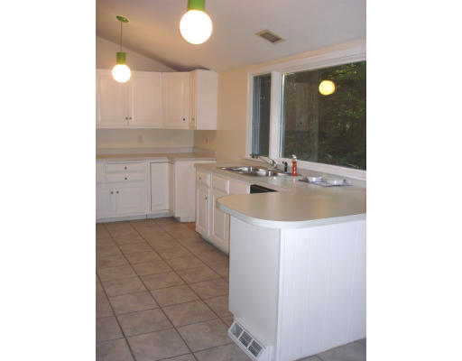 17 Number 6 Road Leverett, MA 01054 - Photo 2 of 6 a kitchen with a sink cabinets and utility
