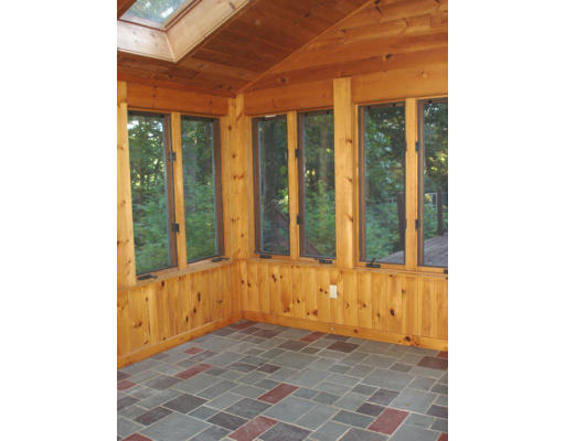 17 Number 6 Road Leverett, MA 01054 - Photo 4 of 6 a view of a porch with a sink and a yard