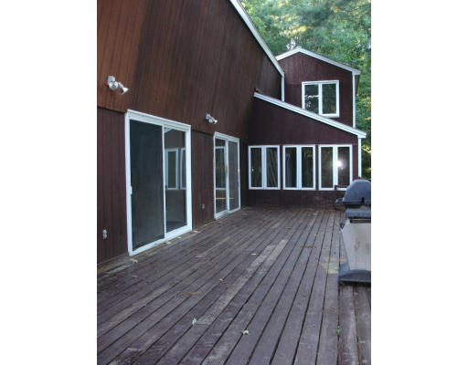 17 Number 6 Road Leverett, MA 01054 - Photo 5 of 6 a view of a house with wooden deck