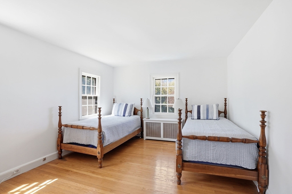 34 Governor Long Road Hingham, MA 02043 - Photo 12 of 37 a bedroom with bed and windows