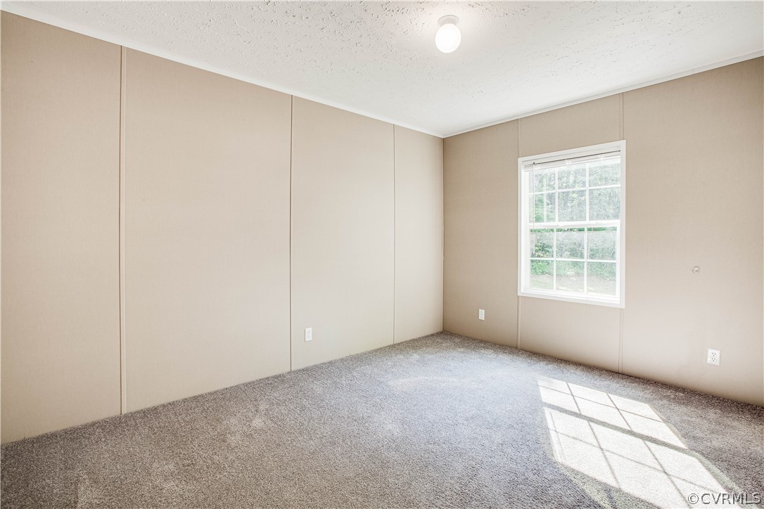 411 Goodwin Store Road Louisa, VA 23093 - Photo 11 of 38 a view of an empty room with a window