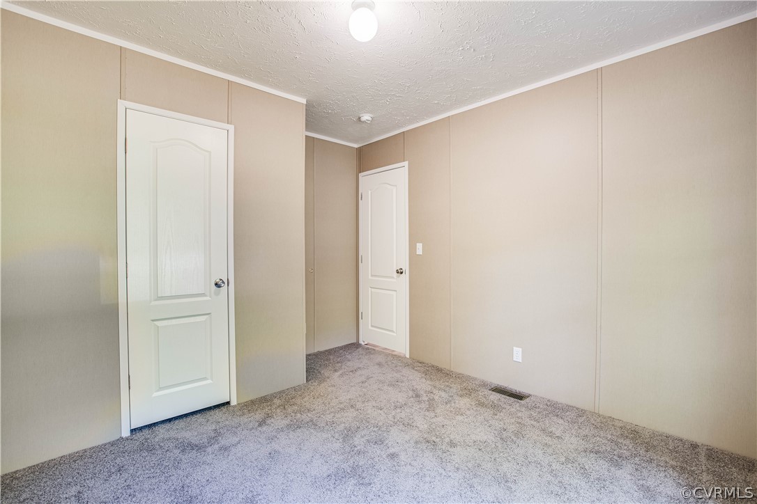 411 Goodwin Store Road Louisa, VA 23093 - Photo 13 of 38 an empty room with closet area