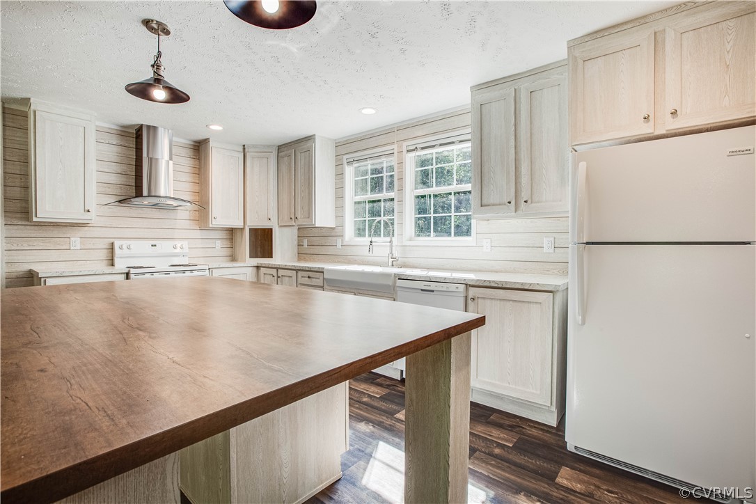 411 Goodwin Store Road Louisa, VA 23093 - Photo 22 of 38 a kitchen with stainless steel appliances granite countertop a sink a refrigerator and a stove