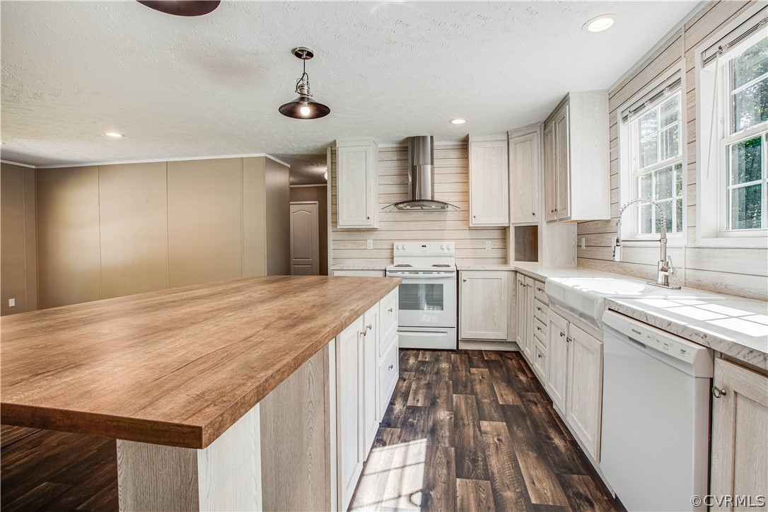 411 Goodwin Store Road Louisa, VA 23093 - Photo 23 of 38 a kitchen with a stove sink and cabinets