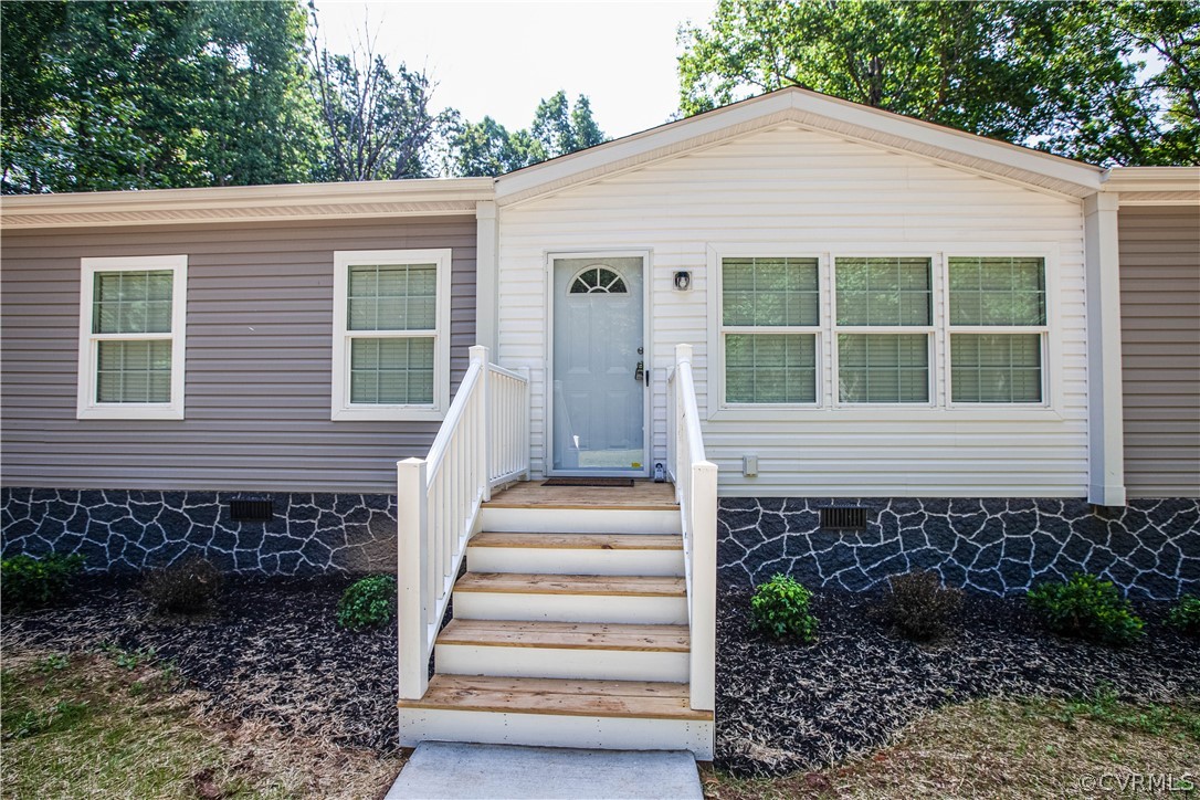 411 Goodwin Store Road Louisa, VA 23093 - Photo 36 of 38 a front view of a house with a yard