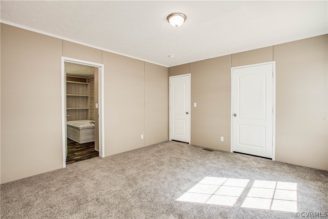 411 Goodwin Store Road Louisa, VA 23093 - Photo 4 of 38 an empty room with closet