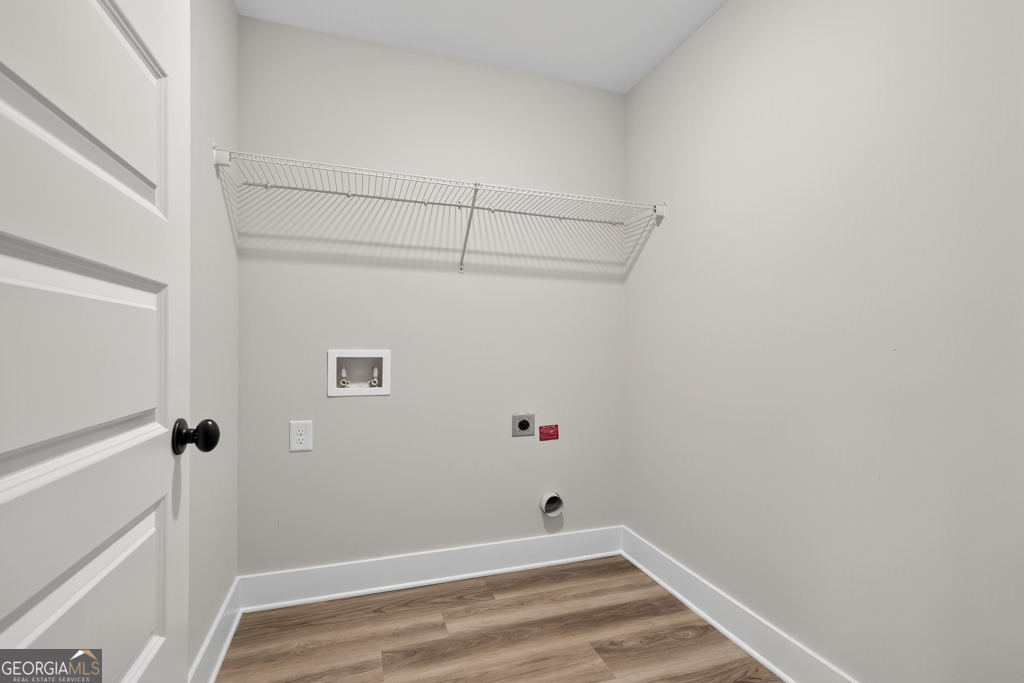 274 Mockingbird Lane, Unit 27 Winder, GA 30680 - Photo 27 of 29 a view of small space with racks on the wall