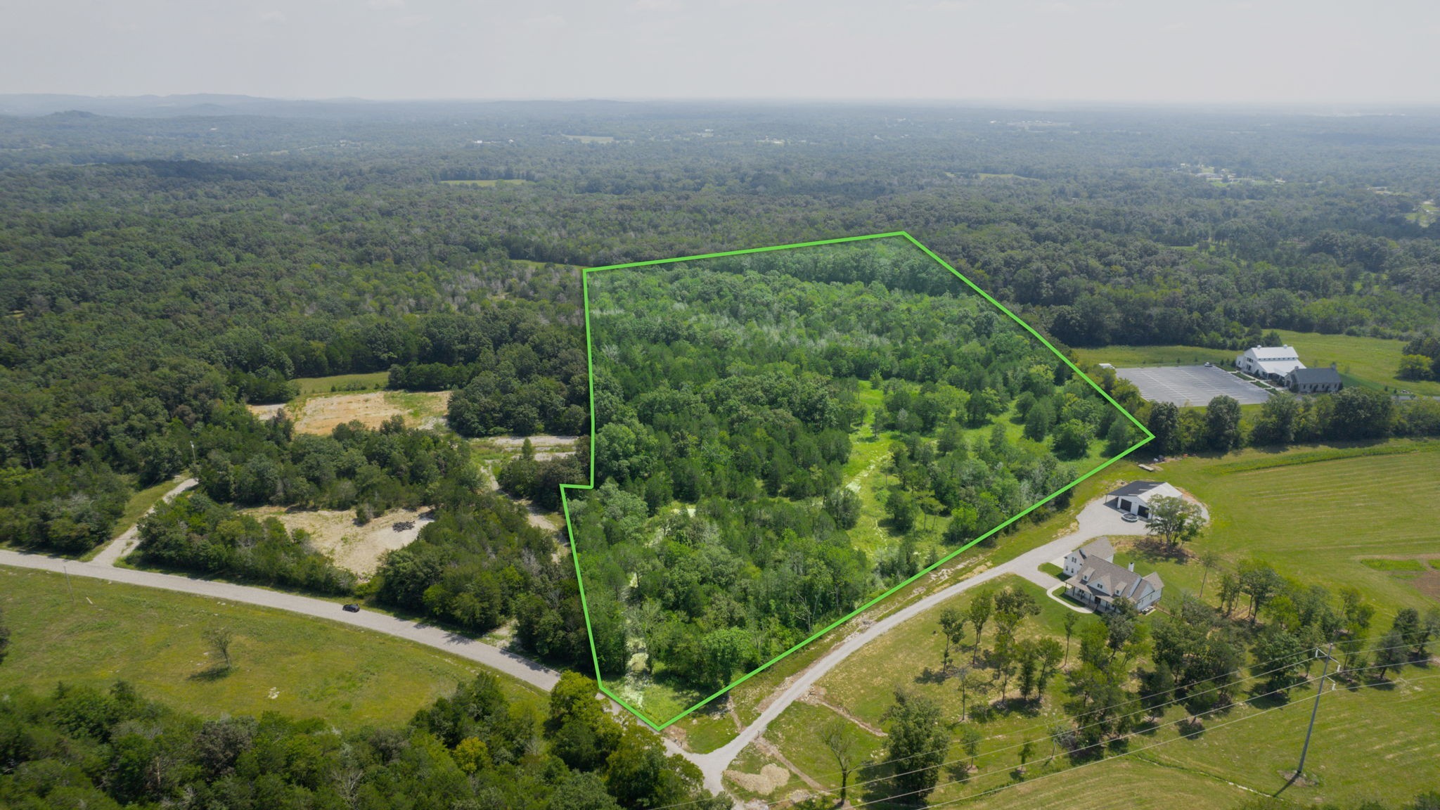 0 Ollie Chunn Road Spring Hill, TN 37174 - Photo 1 of 16 an aerial view of a residential houses with outdoor space and trees