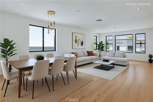 a kitchen with stainless steel appliances kitchen island wooden cabinets and granite counter tops