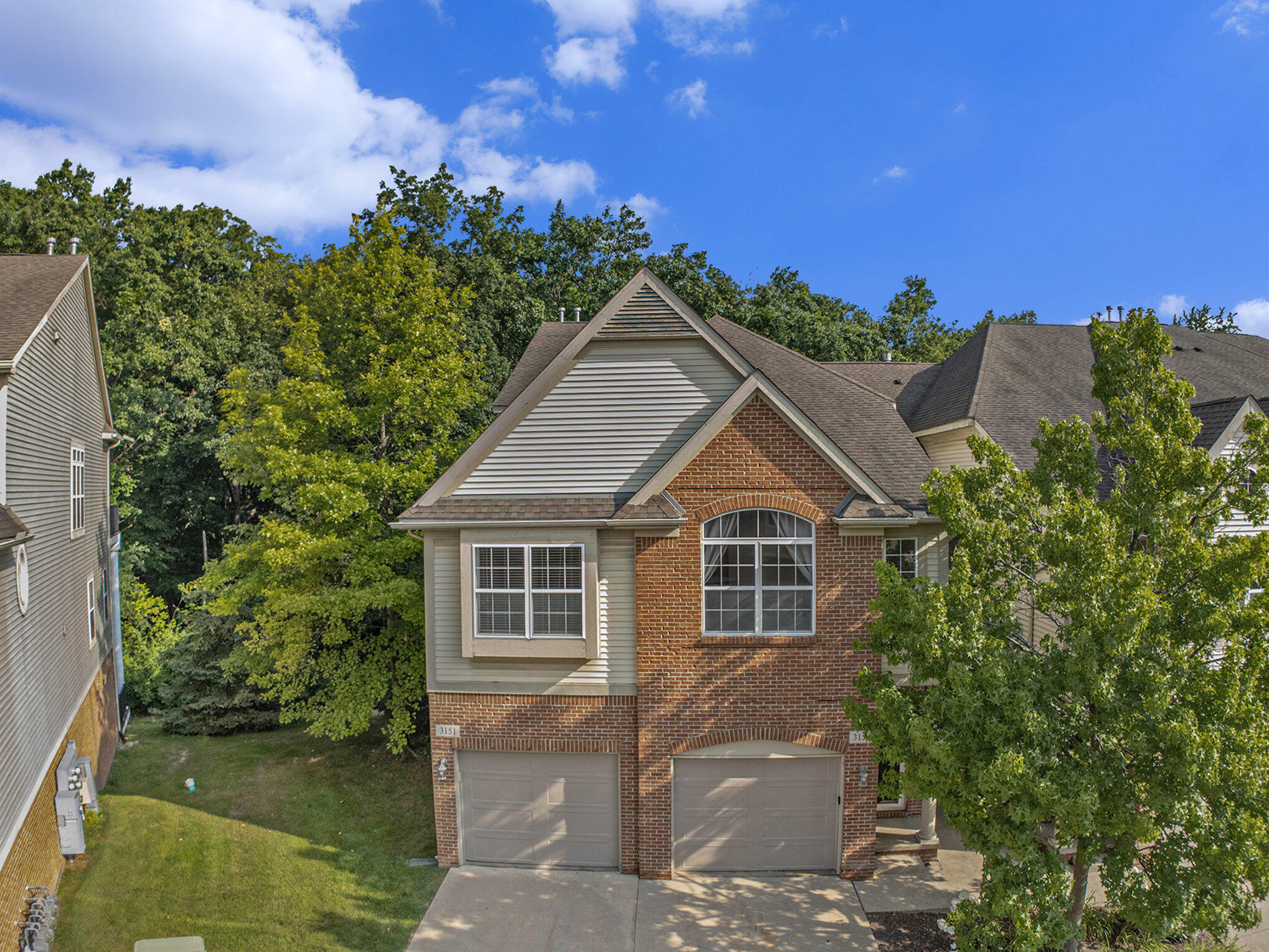 3151 Asher Road, Unit 24 Ann Arbor, MI 48104 - Photo 3 of 32 029_dji_20240801093730_0001_d_377