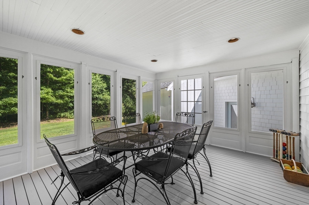 44 Walnut Road Hamilton, MA 01982 - Photo 14 of 39 a view of a dining room with furniture window and outside view