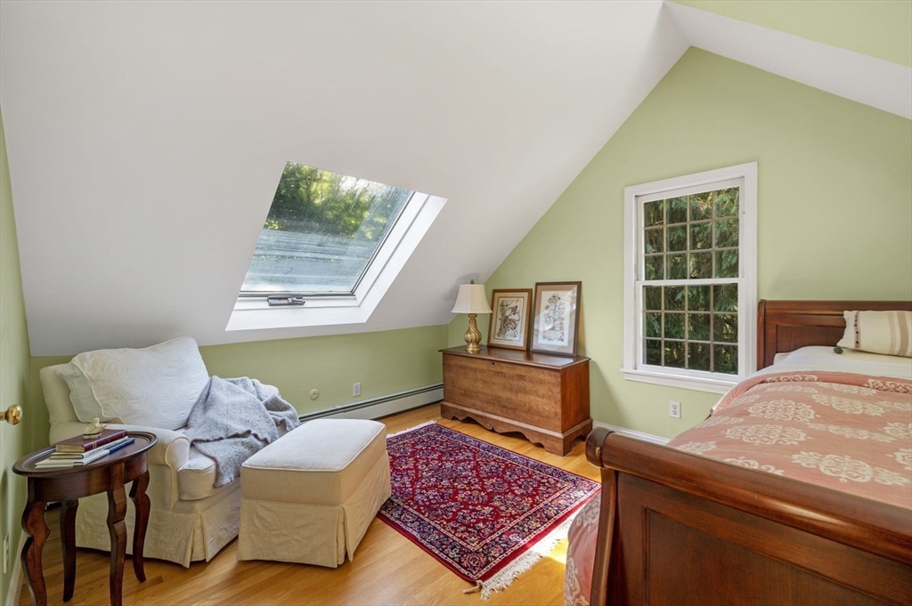 44 Walnut Road Hamilton, MA 01982 - Photo 23 of 39 a living room with a couch and a window