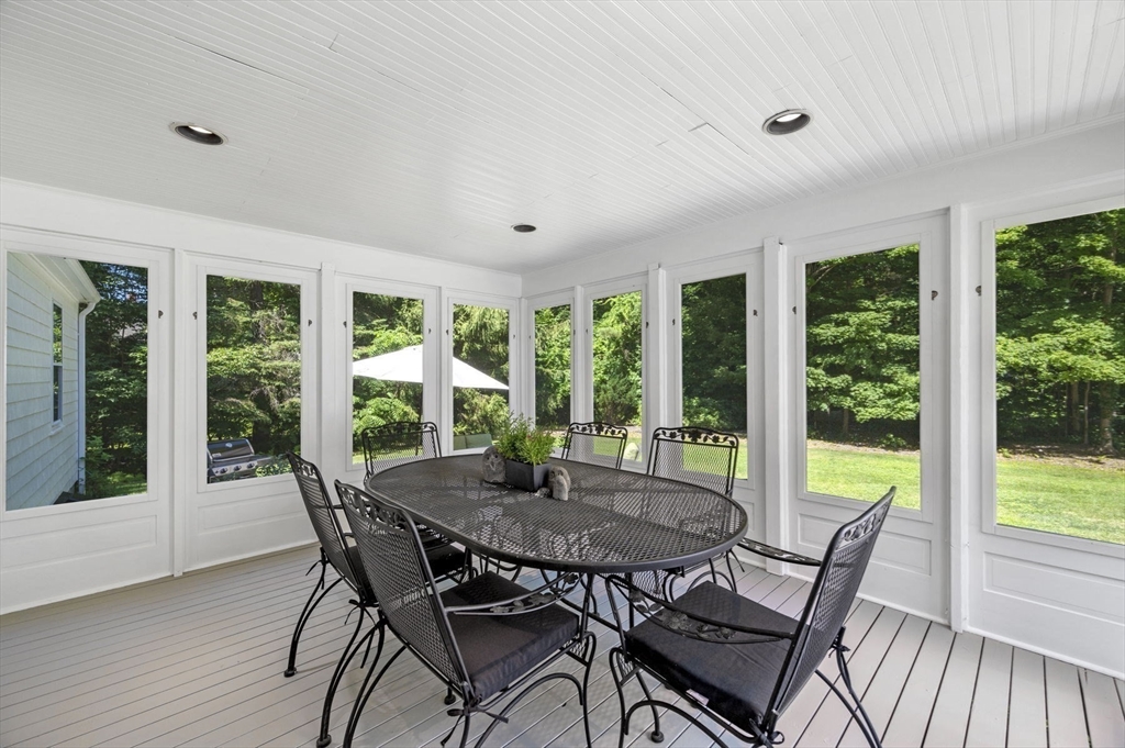 44 Walnut Road Hamilton, MA 01982 - Photo 34 of 39 a view of a dining room with furniture window and outside view