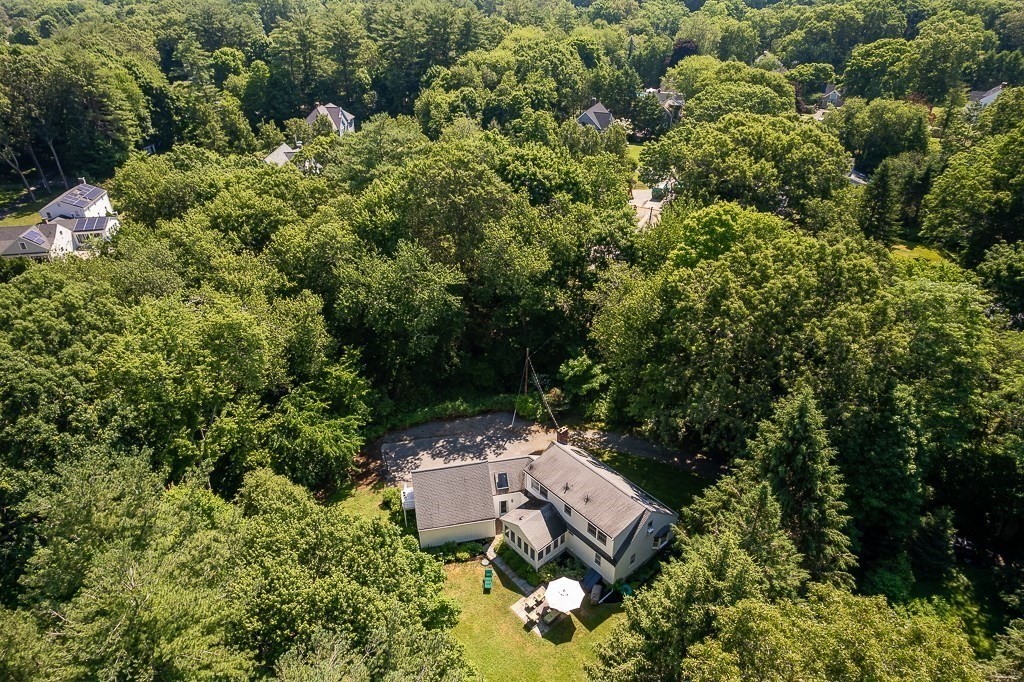 44 Walnut Road Hamilton, MA 01982 - Photo 4 of 39 a view of a house with a yard and sitting area