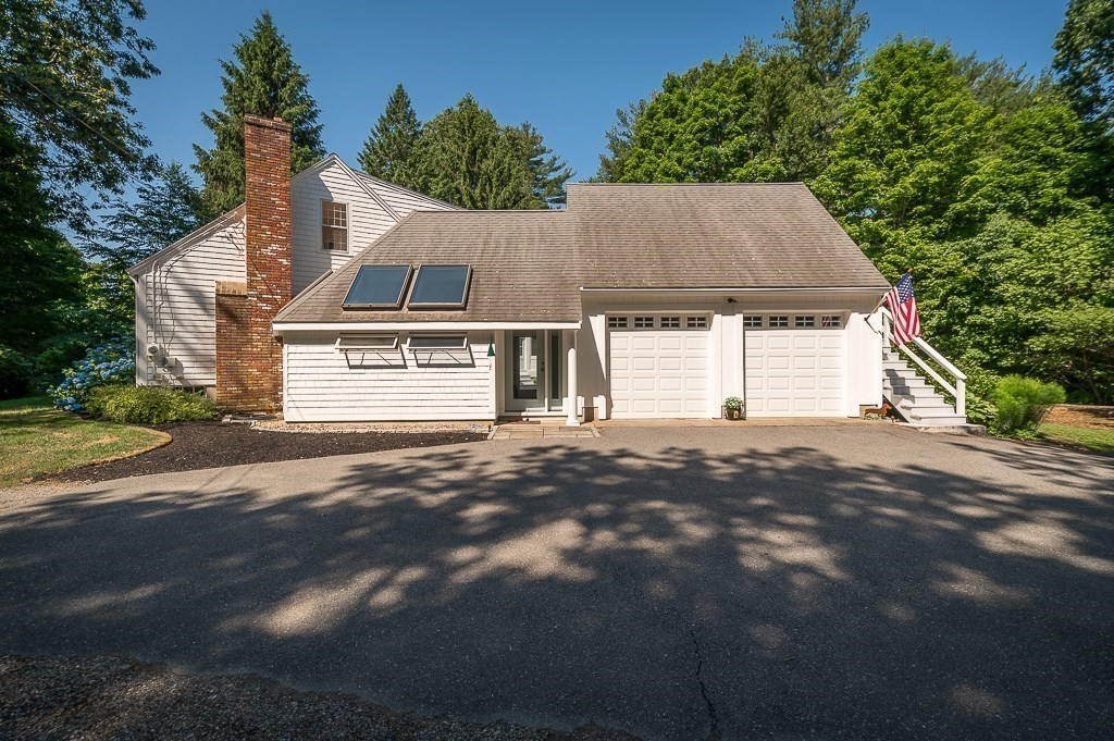 44 Walnut Road Hamilton, MA 01982 - Photo 5 of 39 a view of a house with a yard