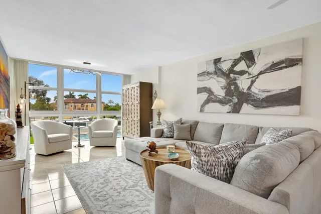 a living room with furniture and a couch