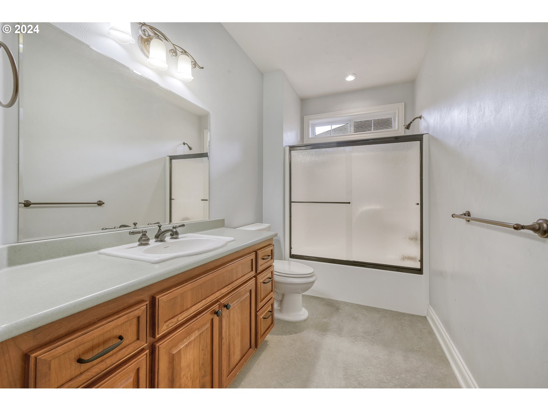 3349 Roanoke Avenue Eugene, OR 97408 - Photo 16 of 36 a bathroom with a double vanity sink mirror and shower