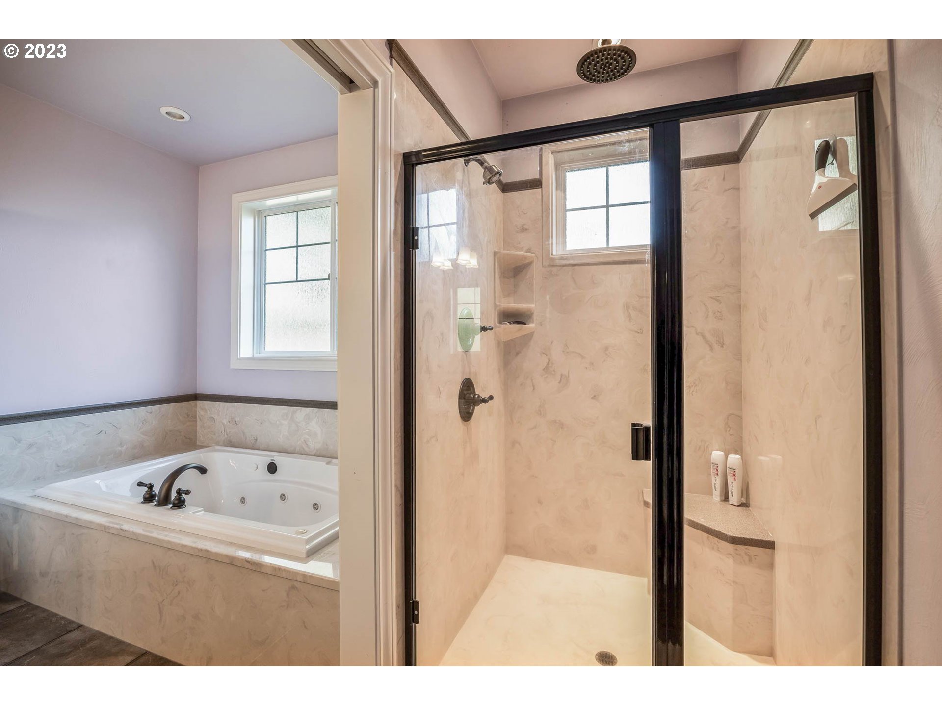 3349 Roanoke Avenue Eugene, OR 97408 - Photo 19 of 36 a bathroom with a bathtub and a shower