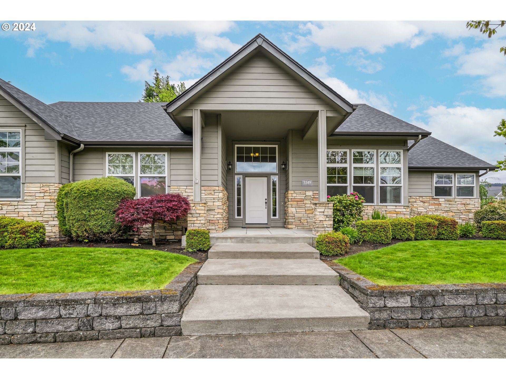 3349 Roanoke Avenue Eugene, OR 97408 - Photo 2 of 36 a front view of a house with a yard