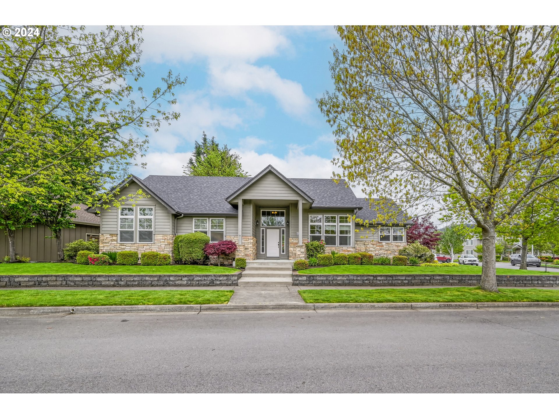 3349 Roanoke Avenue Eugene, OR 97408 - Photo 3 of 36 a front view of a house with a yard and trees