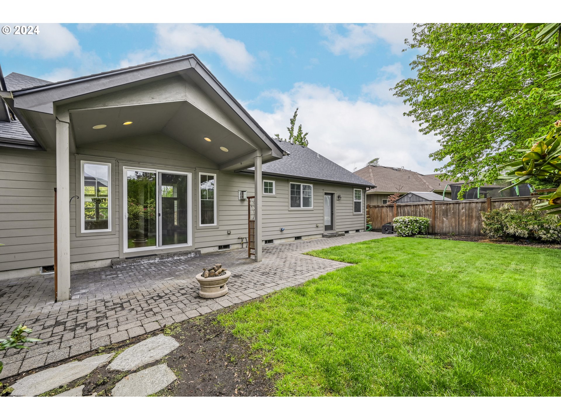 3349 Roanoke Avenue Eugene, OR 97408 - Photo 34 of 36 a view of a house with a yard porch and sitting area