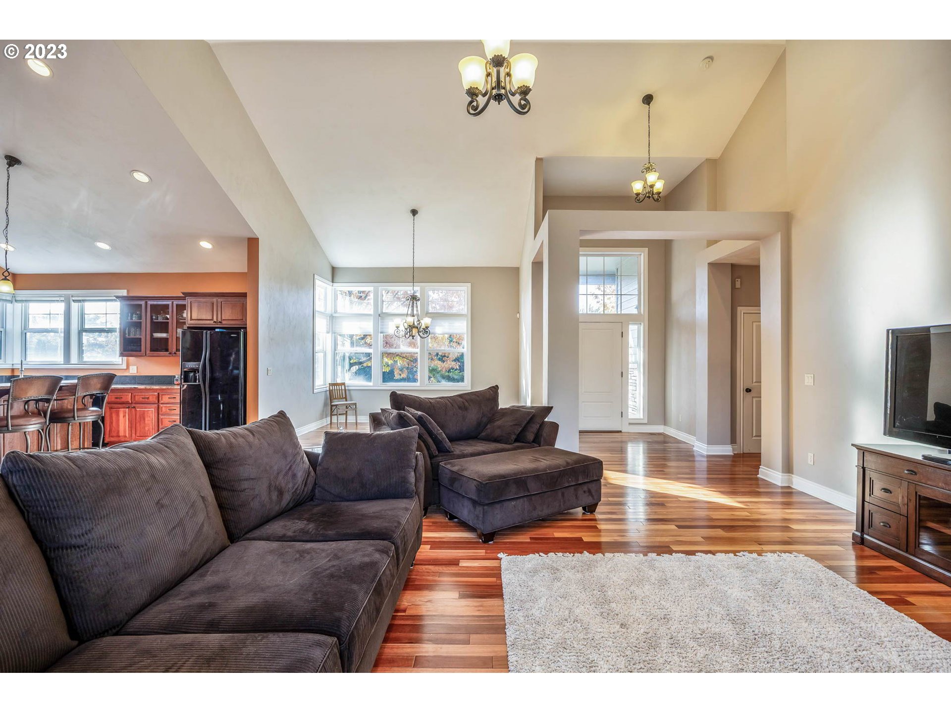 3349 Roanoke Avenue Eugene, OR 97408 - Photo 8 of 36 a living room with furniture and a flat screen tv