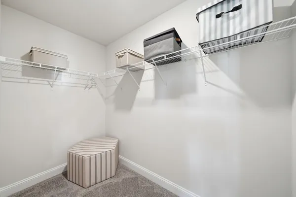 a bathroom with a shower a toilet and sink