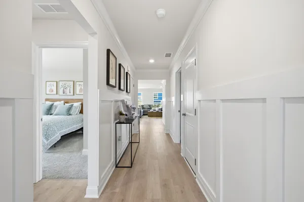 a kitchen with stainless steel appliances kitchen island granite countertop a refrigerator and a stove top oven