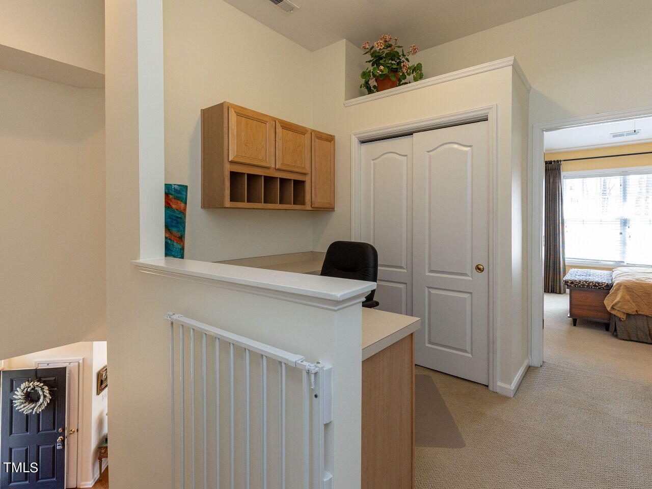 1431 Basinger Court Raleigh, NC 27612 - Photo 17 of 31 a kitchen with a refrigerator and a sink